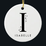 Adorno De Cerámica Monograma I Nombre celular<br><div class="desc">Añada un toque de magia celeste a su decoración navideña con este impresionante adorno navideño monograma. Con una carta adornada con pequeñas estrellas y lunas a su alrededor y su elección de nombre debajo, este adorno personalizado es el recuerdo perfecto para la temporada. Se puede ajustar cómodamente hasta 10 caracteres...</div>