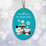 Adorno De Cerámica Navidades de los niños del Pingüino del Polo Norte<br><div class="desc">¡Directamente desde el Polo Norte, un muñeco de nieve personalizado y un pingüino llevan saludos de vacaciones a su hijo! Se paran frente a un poste de rayas rojas y blancas con un cartel que dice Polo Norte. Las imágenes se colocan sobre un fondo azul cielo brillante. ¡Luminoso y colorido!...</div>