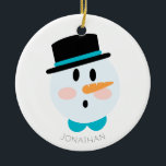 Adorno De Cerámica Navidades de Snowman personalizados en invierno<br><div class="desc">El Invierno Agradable Personalizado Snowman Enfrenta El Ornamento De Cerámica De Los Navidades. El diseño tiene un muñeco de nieve de gorra y zanahoria. Gran regalo de Navidades para la familia y amigos.</div>
