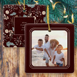 Adorno De Cerámica Navidades del Boho Photo Winter Greenery<br><div class="desc">Este sencillo adorno de Navidad con fotos familiares ofrece espacio para una foto cuadrada con un oscuro fondo burdeos. En el fondo, un bonito patrón de vegetación de invierno que aparece en suaves tanques y culebras en el mismo fondo burdeos oscuro y ofrece texto personalizado para tu nombre y año....</div>
