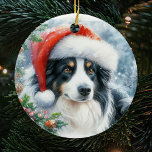 Adorno De Cerámica Navidades del Tricoled Border Collie Santa Hat<br><div class="desc">Disfrute del espíritu festivo con nuestro ornamento cerámico de Navidades de la Frontera Tricolores del Collie Santa Hat, con una encantadora representación de su querido compañero canino adornado con un festivo sombrero de Santa Hat. Este único adorno le añade un toque de alegría navideña a su árbol de Navidad, capturando...</div>