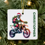 Adorno De Cerámica Navidades Dirt Bike Motocross Nombre personalizado<br><div class="desc">¡Diviértete con este adorno navideño de Navidad! Con un jinete en acción en bicicleta de tierra, decorado con ramas de pino festivas y adornos coloridos, este adorno es perfecto para los amantes de la motocross y la aventura. Ya sea que añadas un toque único a tu árbol o que lo...</div>