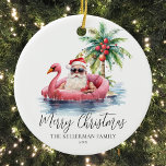 Adorno De Cerámica Navidades divertidos<br><div class="desc">Sumérgete en el espíritu de las vacaciones con este único adorno navideño que incluye un Santa Claus relajado con gafas de sol tumbado en un flamenco rosa flotando en el océano. Perfecto para añadir un ambiente de playa a tu árbol de Navidad, este adorno es ideal para aquellos que viven...</div>