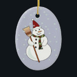 Adorno De Cerámica Navidades Snowman Ornament<br><div class="desc">Feliz hombre de nieve usando un sombrero de santa con nieve flotando a su alrededor.</div>