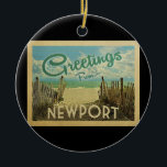 Adorno De Cerámica Newport Rhode Island Ornament Beach<br><div class="desc">El diseño de esta postal antigua de Greetings From Newport incluye una playa de arena con un hermoso agua turquesa del océano y sobre el mar,  un cielo azul con nubes blancas onduladas. En estilo de viajes vintage.</div>