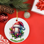 Adorno De Cerámica Nombre personalizado de béisbol para navidades con<br><div class="desc">Hagan un recorrido en casa con su decoración de vacaciones con este adorno festivo de béisbol! Con una clásica pelota de béisbol con un sombrero de Santa y rodeada de hojas y bayas rojas, este adorno es perfecto para cualquier hincha de béisbol que quiera llevar su amor por el juego...</div>