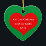 Adorno De Cerámica Nuestros segundos Navidades juntos Corazón Rojo 20<br><div class="desc">Nombres personalizados e impresos con un bonito diseño de corazón rojo en un fondo verde sólido. Siéntete libre de personalizar añadiendo tus propios textos,  nombres o fotos. ¡Puedes añadir tu foto en la parte posterior del adorno fácilmente! El color del fondo también se puede cambiar como se desee.</div>