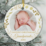 Adorno De Cerámica Our First Christmas As Grandparents Gold Photo<br><div class="desc">This elegant Grandparents Christmas Ornament is decorated with gold foliage on a white background.
Easily customizable with baby's photo and year.
Original Watercolor © Michele Davies.</div>