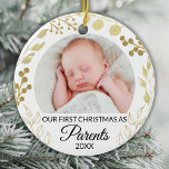 Adorno De Cerámica Our First Christmas As Parents Photo Gold Foliage<br><div class="desc">This elegant Parents' Christmas Ornament is decorated with gold foliage on a white background.
Easily customizable with baby's photo and year.
Original Watercolor © Michele Davies.</div>