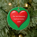 Adorno De Cerámica Our Third Christmas Together Cute Red Heart 2019<br><div class="desc">Personalized names and printed with cute red heart design in solid green background. Feel free to customize by adding your own texts,  names or photos. You can add your photo on the back side of the ornament easily!
The color of the background can also be changed as you want.</div>