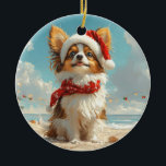 Adorno De Cerámica Papillon Dog Navidades Vintage Beach<br><div class="desc">Traiga el calor de las vacaciones a la orilla con este encantador diseño de estilo vintage con un perro de festividad sentado en una tranquila playa. Con un toque vacacional clásico de tonos nostálgicos y vibraciones costeras, esta obra de arte capta la magia de los Navidades junto al mar. Perfecto...</div>
