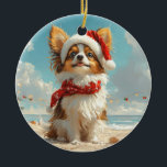 Adorno De Cerámica Papillon Dog Navidades Vintage Beach<br><div class="desc">Traiga el calor de las vacaciones a la orilla con este encantador diseño de estilo vintage con un perro de festividad sentado en una tranquila playa. Con un toque vacacional clásico de tonos nostálgicos y vibraciones costeras, esta obra de arte capta la magia de los Navidades junto al mar. Perfecto...</div>