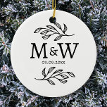 Adorno De Cerámica Pareja Monograma Boda Fecha Elegante Botánica<br><div class="desc">Añada un toque de clase a su decoración con este único diseño de hojas botánicas de monograma de pareja personalizada inicial y fecha boda. Fuente serif moderna,  minimalista y sencilla para un aspecto sofisticado. Arte original de Nic Squirrell.</div>
