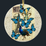 Adorno De Cerámica París, pavo real y mariposas<br><div class="desc">El collage digital femenino romántico elegante elegante bonito de un pájaro y mariposas y una torre Eiffel azules,  París,  Francia del pavo real en un fondo y un francés de la postal del papel del vintage sella con la flor de lis del oro. derechos reservados Oconnart</div>
