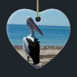 Adorno De Cerámica Pelican On Beach Rock<br><div class="desc">Un pelícano hambriento,  muy guapo,  espera a los borlos de pescado.</div>