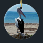 Adorno De Cerámica Pelican On Beach Rock<br><div class="desc">Un pelícano hambriento,  muy guapo,  espera a los borlos de pescado.</div>