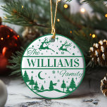 Adorno De Cerámica Personalizado Nombre de familia Navidades clásicos<br><div class="desc">Añade un toque divertido y festivo a tu árbol de Navidad este año con un adorno personalizado que puede transmitirse por generaciones. Este diseño clásico, verde y blanco, presenta renos que sobrevuelan un paisaje de nieve lleno de pinos con un único muñeco de nieve vigilando. Personalice agregando su apellido. ¡Hace...</div>