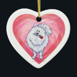 Adorno De Cerámica Pomerania Blanca Día de San Valentín<br><div class="desc">Desfile de Animales Romántico Perro Pomerania Blanco regalos personalizados de Corazón y Amor, tarjetas y accesorios que te trae Imagine That! El diseño cuenta con nuestro divertido arte de un perro Pomerania blanco que sostiene una hermosa rosa en su boca con corazones morados, rojos y rosados detrás, pintado digitalmente por...</div>