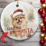 Adorno De Cerámica Pomerania Esperando A Los Navidades De Perro De Sa<br><div class="desc">El ornamento cerámico Pomeranian Waiting For Santa Snowy Dog Navidades captura la magia de la temporada navideña. Con un ampuloso cachorro pomerano en un gorra rojo festivo, este diseño acuarela da vida a la alegría y la anticipación de los Navidades. La nevada escena invernal aporta un toque sereno, evocando recuerdos...</div>
