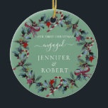 Adorno De Cerámica Primera Wreath verde sabia de Navidad comprometida<br><div class="desc">El ornamento romántico para pareja casada o casada presenta hermosas flores de Navidad. Puede cambiar el color de fondo si lo desea.</div>