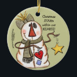 Adorno De Cerámica Primitivo hombre de nieve con corazón y estrella<br><div class="desc">Un muñeco de nieve de aspecto primitivo tiene una estrella y un corazón. ¡Mensaje que Navidades STAR dentro de nuestros CORAZONES! Diseño original de Christie Black de Creations from the Heart.</div>