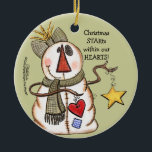 Adorno De Cerámica Primitivo hombre de nieve con corazón y estrella<br><div class="desc">Un muñeco de nieve de aspecto primitivo tiene una estrella y un corazón. ¡Mensaje que Navidades STAR dentro de nuestros CORAZONES! Diseño original de Christie Black de Creations from the Heart.</div>