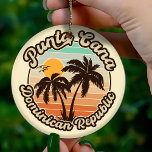 Adorno De Cerámica Punta Cana Dominicana Palm Tree Retro Sunset 60<br><div class="desc">El diseño de la playa de Punta Cana retro para las vacaciones. Isla del Caribe Punta Cana Venecia de recuerdo para viajar a la isla del Caribe. Arte de playa de Punta Cana para turistas y mochileros dominicanos. Punta Cana en el recuerdo caribeño retro. Diseño para mochileros y viajes a...</div>