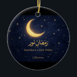 Adorno De Cerámica Ramadan Moon Islamic Art – Ramadan Is a Light With<br><div class="desc">Celebrate the beauty and spiritual glow of Ramadan with this elegant crescent moon artwork. Featuring a luminous golden crescent surrounded by stars on a deep midnight-blue background, this design symbolizes the light, reflection, and serenity of the holy month. The Arabic calligraphy “Ramadan Nur” is paired with the inspiring message “Ramadan...</div>