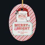 Adorno De Cerámica Santa Rosa y Roja | Merry y Bright<br><div class="desc">Este adorno navideño presenta un alegre diseño de Santa con un texto que dice "Feliz y Brillante". Puedes personalizar tu nombre y año en la parte inferior. En la parte posterior hay otro patrón de rayas diagonales rosadas y rojas coordinadas.</div>