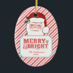 Adorno De Cerámica Santa Rosa y Roja | Merry y Bright<br><div class="desc">Este adorno navideño presenta un alegre diseño de Santa con un texto que dice "Feliz y Brillante". Puedes personalizar tu nombre y año en la parte inferior. En la parte posterior hay otro patrón de rayas diagonales rosadas y rojas coordinadas.</div>