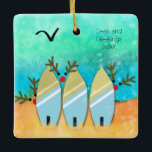 Adorno De Cerámica Seas and Greetings Beach Christmas with Rudolph<br><div class="desc">3 red nose reindeers hide behind their surf boards in this cute coastal Christmas scene. The message on the front is easily customized.</div>