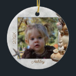 Adorno De Cerámica Seashell Frame Photo Ornament<br><div class="desc">Seashell photo frame ornament.  Add a kids or baby's picture along with name and year to this round,  double-sided ornament.  Makes a nice,  personalized photo gift.</div>