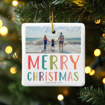 Adorno De Cerámica Simple y colorida foto de la familia navideña<br><div class="desc">Esta familia simple y divertida adorno de Feliz Navidad ofrece un lugar para que añadas tus nombres, con ‘Feliz Navidad’ en una tipografía colorida y brillante, así como espacio para que añadas tu propia foto de paisaje. En la parte de atrás hay un colorido diseño de puntos polka. La perfecta...</div>