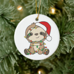 Adorno De Cerámica Sloth Navidades Winter Animals Sloths<br><div class="desc">La pereza con Navidades con luces de hadas. Animales divertidos con regalos y nieve para las vacaciones. Un saludo de Navidades dulces. Las locuras son animales lindos y perfectas para los Navidades.</div>