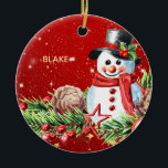 Adorno De Cerámica Sombrero de cabeza de Snowman - Baby Keepsake pers<br><div class="desc">¡Trae un encanto extraordinario a tu decoración de vacaciones con el ornamento de Snowman Sonriente! Este diseño festivo cuenta con un encantador muñeco de nieve de acuarela con un sombrero clásico de la parte superior negra adornado con una cinta roja y hojas huecas con bayas. Su alegre bufanda roja, su...</div>