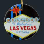 Adorno De Cerámica Temporada navideña de Las Vegas<br><div class="desc">Usted puede personalizar este ornamento de Las Vegas y utilizarlo como una divertida decoración para paquetes o en lugar de una tarjeta y hacer que su saludo de vacaciones sea memorable!</div>
