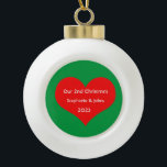 Adorno De Cerámica Tipo Bola Nuestros segundos Navidades juntos Corazón Rojo 20<br><div class="desc">Nombres personalizados e impresos con un bonito diseño de corazón rojo en un fondo verde sólido. Siéntete libre de personalizar añadiendo tus propios textos,  nombres o fotos. ¡Puedes añadir tu foto en la parte posterior del adorno fácilmente! El color del fondo también se puede cambiar como se desee.</div>