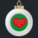 Adorno De Cerámica Tipo Bola Nuestros segundos Navidades juntos Corazón Rojo 20<br><div class="desc">Nombres personalizados e impresos con un bonito diseño de corazón rojo en un fondo verde sólido. Siéntete libre de personalizar añadiendo tus propios textos,  nombres o fotos. ¡Puedes añadir tu foto en la parte posterior del adorno fácilmente! El color del fondo también se puede cambiar como se desee.</div>