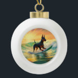 Adorno De Cerámica Tipo Bola Pintura Doberman Beach Surfing<br><div class="desc">Sumérgete en el mundo lúdico de la aventura canina con esta pintura cautivadora. Un perro animado lleva a las olas, subiendo con habilidad al surf en una playa con sol. El vibrante arte captura bellamente la esencia de la emoción en la playa mientras el perro recorre sin miedo las olas,...</div>