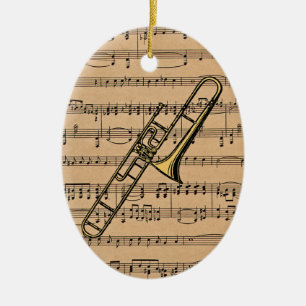 Adorno De Cerámica Trombone con el fondo de la partitura