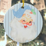 Adorno De Cerámica Vintage azul en polvo Winking Santa Christmas Tree<br><div class="desc">Este hermoso y suave cielo de luz pastel / adorno de árbol de navidad de invierno de Santa Claus azul bebé, presenta un gráfico antiguo de Santa Claus que ha sido coloreado y reimaginado. El fondo es un patrón monocromático de banda vertical tritoniforme. El adorno de cerámica es idéntico en...</div>