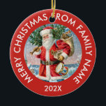 Adorno De Cerámica Vintage Santa Claus<br><div class="desc">Vintage Santa Claus con verduras y regalos navideños y tipografía verde personalizable. Feliz Navidad por el apellido y el año.</div>