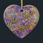 Adorno De Cerámica Winter Batik<br><div class="desc">El adorno cerámico en forma de corazón con una imagen, a ambos lados, de batik morado, dorado y azul con un patrón follaje. "Aku Suka Bali" (Amo Bali en balinés) está impreso al frente en escritura dorada. Ver el ornamento cerámico en forma de camiseta. Ver toda la colección de Bali...</div>