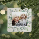 Adorno De Cerámica Winter Sage | Foto botánica de vacaciones<br><div class="desc">Festividad y elegancia en tonos verde claro,  nuestro adorno de fotos de Winter Sage muestra su foto cuadrada favorita (una a cada lado) enmarcada por hojas botánicas verdes esbozadas. Personalice el nombre de su familia por un lado y el año por el otro.</div>