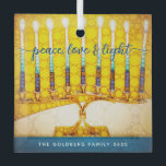 Adorno De Cristal Guión amarillo Hanukkah Menorah Peace Love Light<br><div class="desc">"Paz, amor y luz". Un ilustracion fotográfico digital de primera línea de una brillante, colorida, amarilla y dorada menorah, con tu nombre personalizado, te ayuda a inaugurar la festividad de Hanukkah con estilo. Sienta el calor y la alegría de la temporada de vacaciones cada vez que cuelgues este impresionante y...</div>