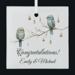 Adorno De Cristal Rustic Woodland Love Birds Celebration<br><div class="desc">Esta encantadora imagen cuenta con dos delicados pájaros encaramados en una rama desnuda, rodeados de luces suspendidas de cristal que parecen farolillos vintage. Los tonos suaves de verde y azul en las plumas de los pájaros y el fondo minimalista le confieren al diseño un toque rústico y caprichoso. Las luces...</div>