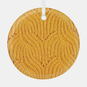 Adorno De Cristal Suéter de punto naranja, fondo texturado.