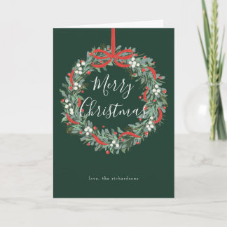 Adorno de Navidad con bayas y lazo