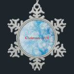 Adorno De Peltre Tipo Copo De Nieve Snowflake background metal ornament<br><div class="desc">Blue snowflakes on a bokeh background.  100% Customization. Click on the CUSTOMIZE button to add,  move,  delete,  resize or change any of the fonts or graphics.</div>