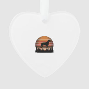 Adorno Diseño vectorial de perro de caza vintage atardece